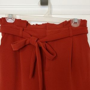 Orange dress or casual pants, high waisted